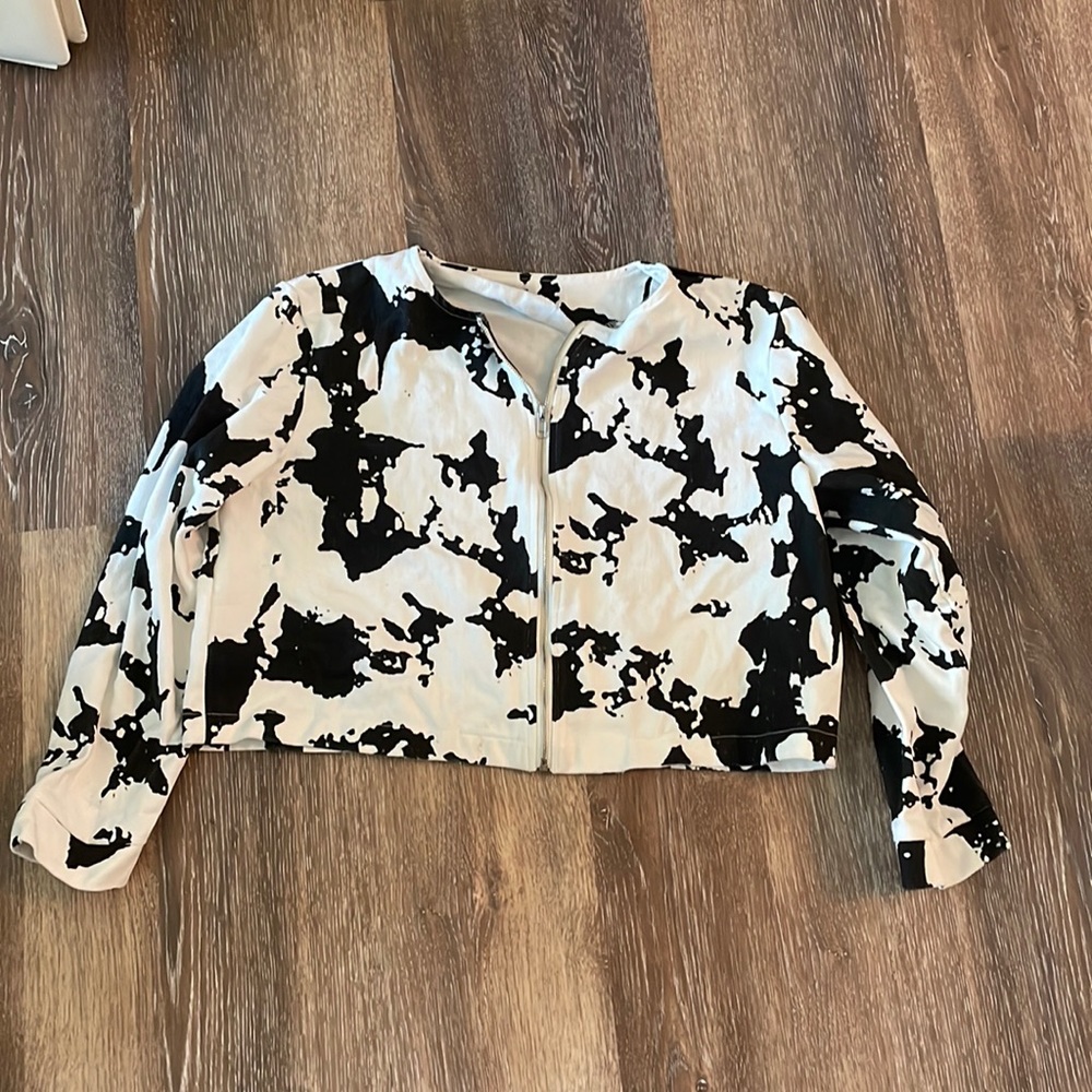 Black and white jacket.